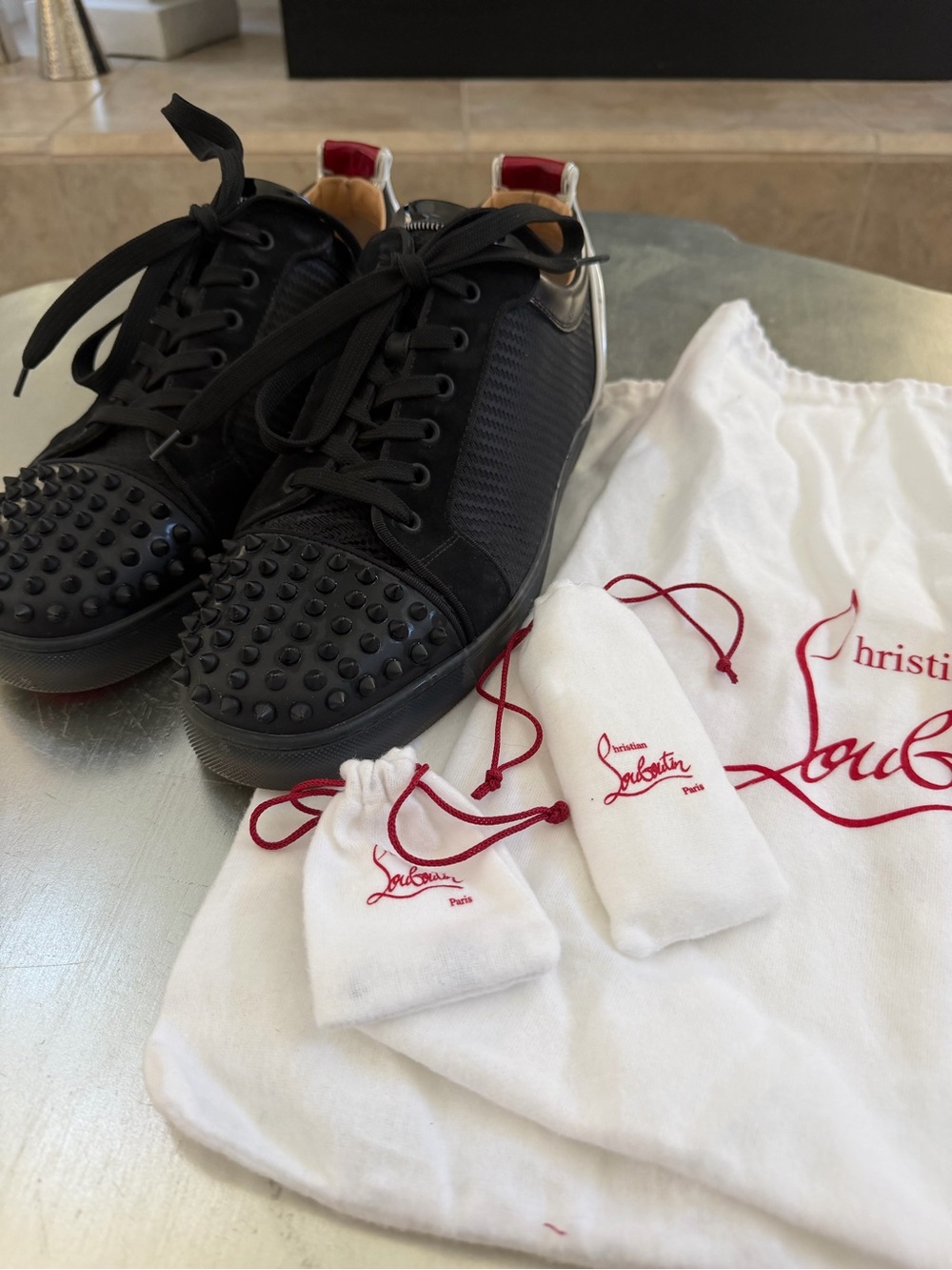 Christian Louboutin Black Studded Low-Top Sneakers with Red Heel Tabs